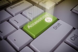 Keyboard with green accessibility button